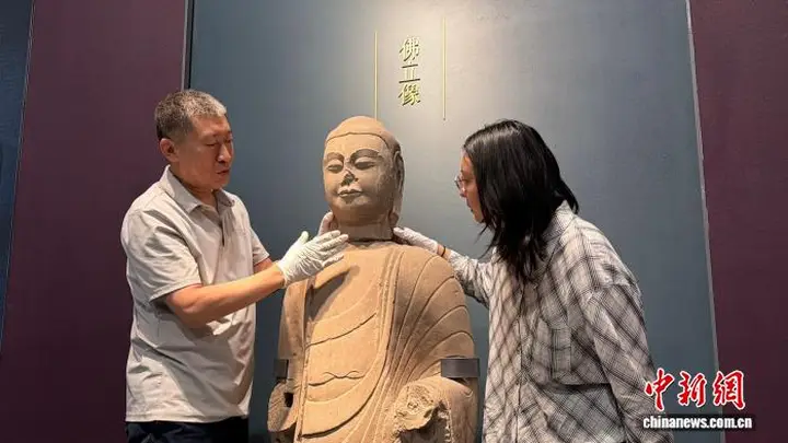 山西汾阳村民捐赠佛首为北齐造像 与馆藏佛立像高度吻合