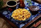 腰果与中国的百年情缘:从海外奇珍到国民零食