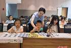太原暑期开展清代篆书宣教活动 青少年体验古法重光